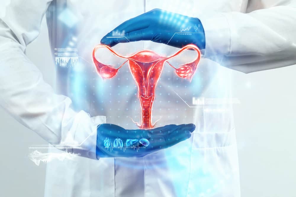 doctor looks hologram female uterus checks test result ovarian disease ectopic pregnancy painful periods surgery innovative technologies medicine future